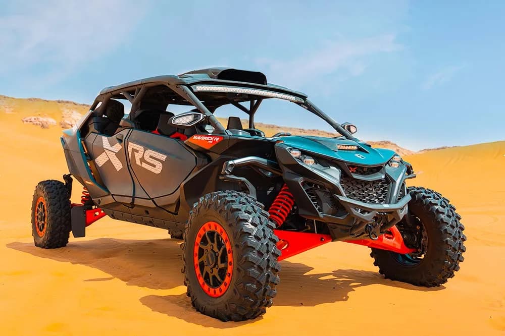 Can-Am Maverick R 4-seat dune buggy on Dubai desert dunes