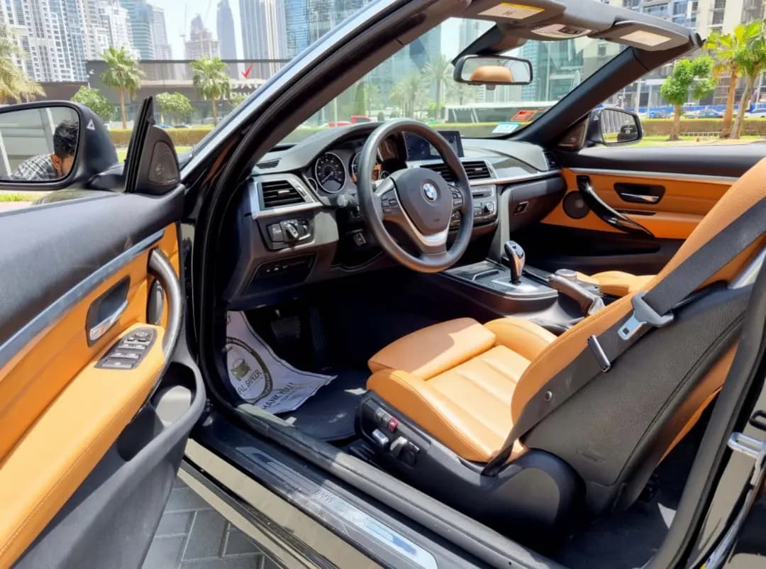 BMW 430i CONVERTIBLE () Black 2021 rental Dubai