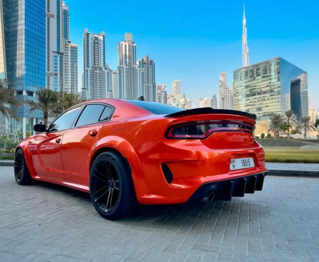 DOdge CHARGER () ORANGE/BLACK 2020 rental Dubai