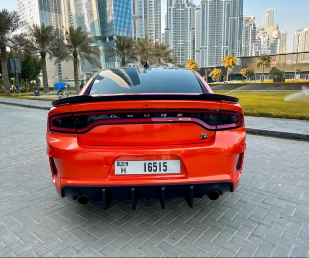 DOdge CHARGER () ORANGE/BLACK 2020 rental Dubai