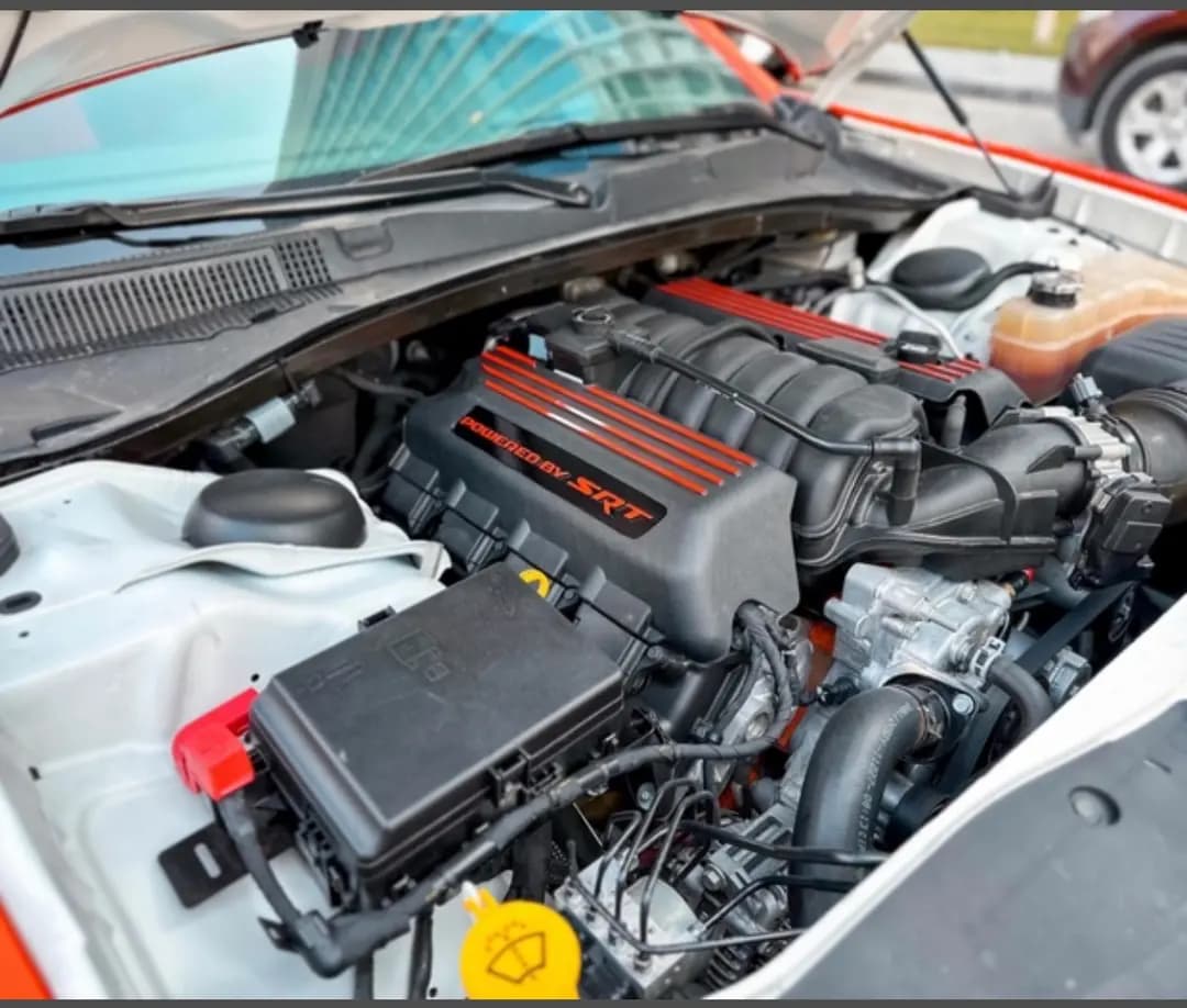 DOdge CHARGER () ORANGE/BLACK 2020 rental Dubai